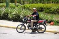Motoconcho waits for a passenger in Boca Chica