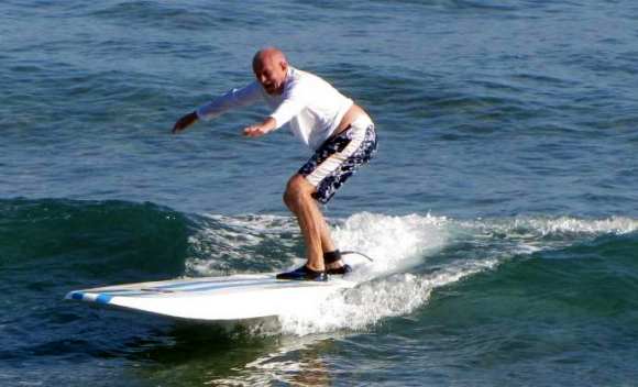 Learning surfing in Playa Encuentro